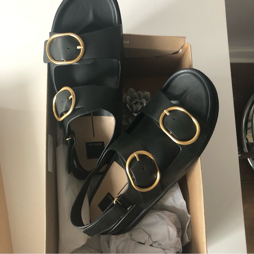 NWT Dolce Vita Starla Black Leather Buckle Sandals with Gold Hardware.
